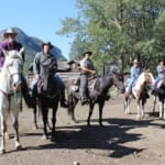 7d Ranch - Group getting ready to go out on horseback.
