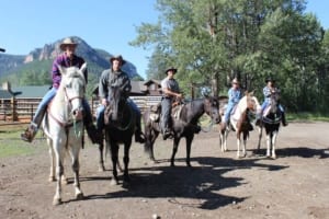 7d Ranch - Group getting ready to go out on horseback.