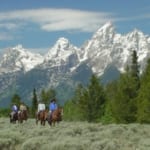 Lost Creek Ranch - Horseback riders on the plains.