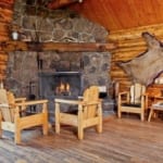 Goosewing Ranch - Lodge with fireplace.