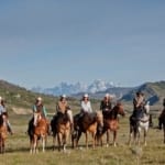Goosewing Ranch - Horseback riders on the plains.