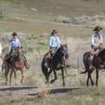 The Hideout Lodge & Guest Ranch - group on horseback.