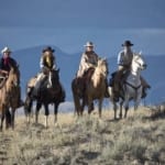 The Hideout Lodge & Guest Ranch - Group on horseback.