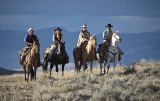 The Hideout Lodge & Guest Ranch - Group on horseback.