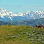 Red Rock Ranch - Horseback riders on the plains.
