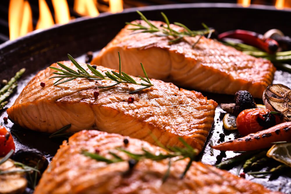 Photo of salmon on a grill: one of the most popular Wyoming ranch foods