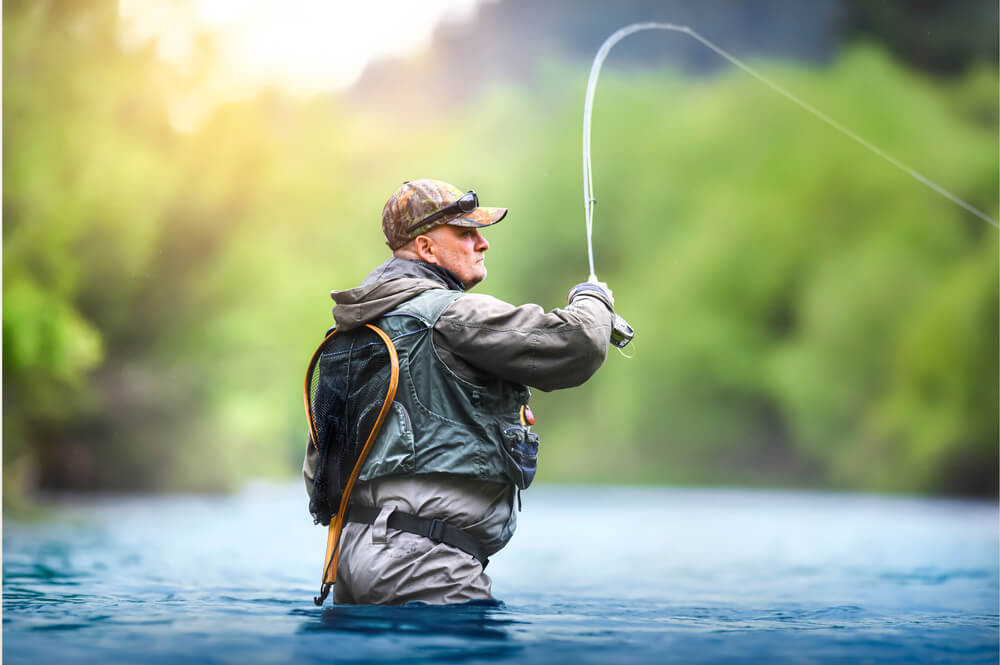 Adult fly fishing at adult only dude ranch week in Wyoming