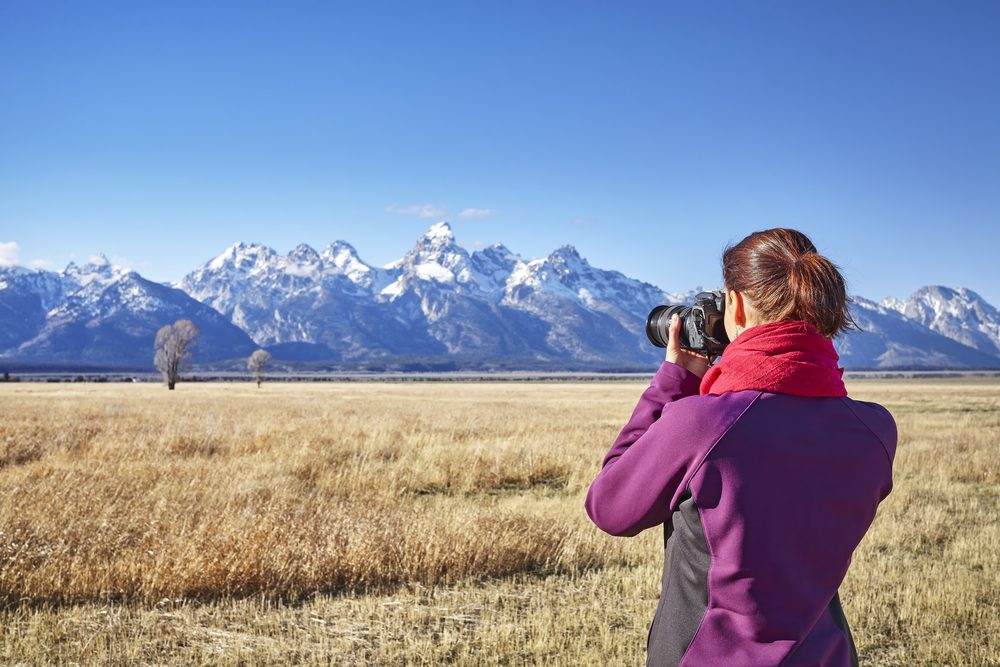 Person photographing the Wyoming landscape